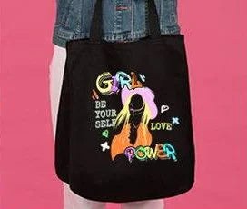 Black tote bag with a DTF printed "Girl Power" design
