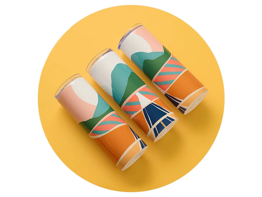 Three sublimated skinny tumblers with a full-wrap landscape design