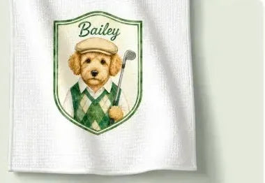 White cotton towel printed with a golfing dog crest